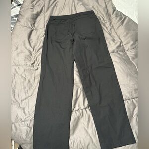 VRST Brand. All black dress pants, open bottom